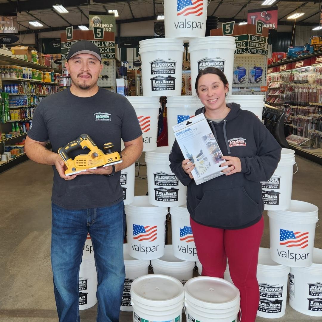 team members holding their tool picks