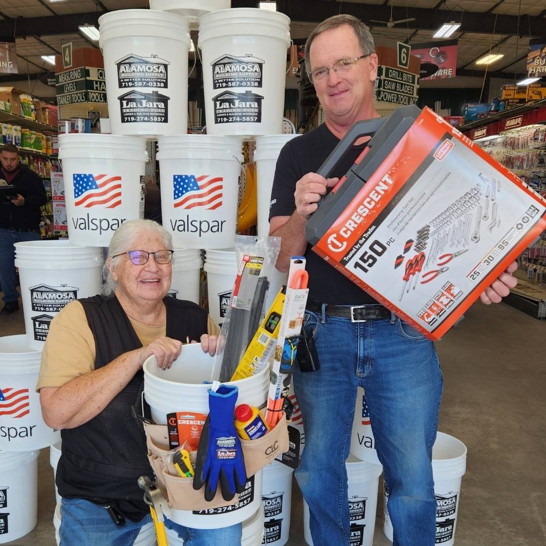 team members holding their tool picks